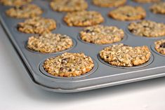 muffins with oatmeal and raisins in a baking pan