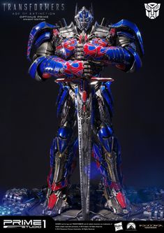 the sideshow prime 1 figure is displayed in front of a black background with blue and red accents