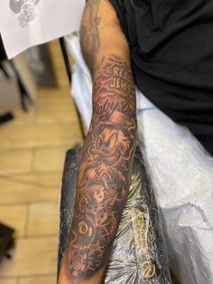 a man with a tattoo on his arm