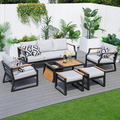 an outdoor patio furniture set on a deck