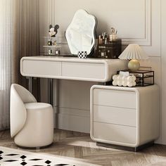 a white desk with a mirror on top of it next to a chair and lamp