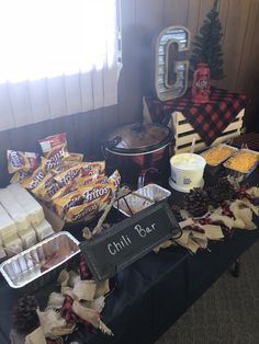 a table filled with lots of food and decorations