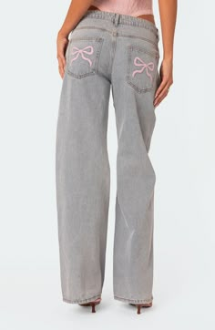 Embroidered pink bows decorate the back pockets of these low-rise wide-leg jeans crafted from nonstretch denim in a faded light wash. Zip fly with button closure Five-pocket style 100% cotton Machine wash, dry flat Imported Cute Preppy Jeans, Trending Clothes 2024, Edikted Outfit Aesthetic, Edikted Jeans, Realistic Wishlist, Bow Jeans, Adrette Outfits, Xmas Wishlist, Smart Tiles