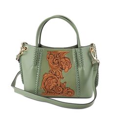 L'Artiste Style: HB-Mare: Western and vintage-inspired leather whipstitched edges, strap ends, and central frame surround an authentic hand-tooled floral saddle design on this super cute and roomy 3-compartment hand-held or cross-bodied tote.   Featuring an adjustable leather removable shoulder strap with double keeper Saddle Design, Spring Step Shoes, Western Women, Hand Painted Leather, Size Chart For Kids, Painting Leather, Bright Gold, Artist Style, Womens Size Chart