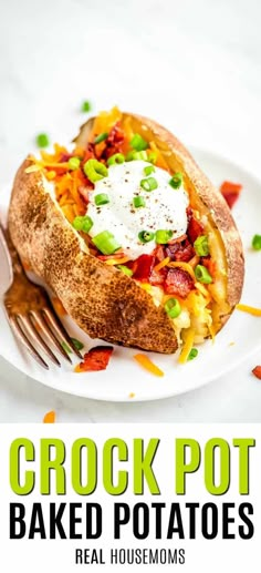 a loaded baked potato on a plate with a fork