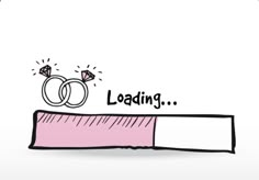 two wedding rings on top of a pink tube with the word loading written in it