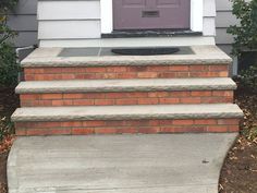 a front porch with steps leading up to the door