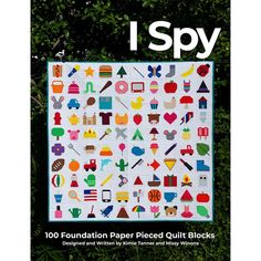 the cover of i spy book, featuring an image of a quilt with different types of objects on it