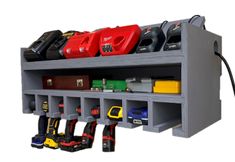 a wall mounted tool organizer holds tools and other items