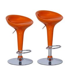 two orange stools sitting next to each other