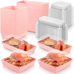 four plastic containers filled with food on top of each other