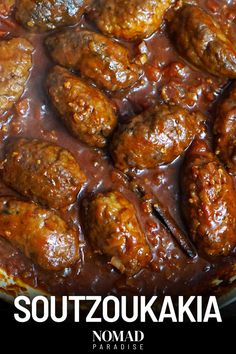 some meatballs are covered in gravy in a skillet with the words southokuka nomad paradise on it