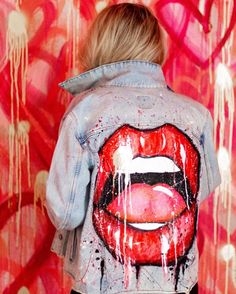 Distressed denim jacket with hand painted lips motif with mixed media elements by Jessica K. Haas. Jacket fits true to size Jean Jacket Diy, Customised Denim Jacket, Custom Jean Jacket, Diy Denim Jacket, Painted Clothes Diy, Custom Denim Jacket, Hand Painted Denim Jacket, Denim Art, Painted Denim Jacket