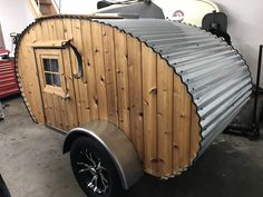 the trailer is made out of wood and metal