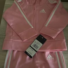 Infant Girls Adidas Sweatsuit Size 6 Months Light Pink Adidas Sports Set With Long Sleeve, Fitted Pink Sportswear Tracksuit, Adidas Sporty Playwear Sets, Pink Fitted Tracksuit For Sports, Fitted Pink Tracksuit For Sports, Pink Adidas Cotton Set, Adidas Pink Cotton Sets, Adidas Long Sleeve Playwear Sets, Pink Cotton Adidas Sets