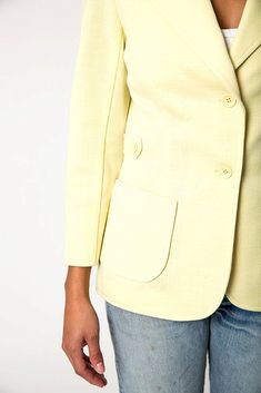 "Wear this bright yellow blazer this season over your favorite bottoms. Estimate Size: S Wool Blend Brand: Koret of California Length: 25\" Bust: 33\" Waist: 31\" Shoulder: 14\"" Spring Blazer With Button Closure And Flat Front, Spring Blazer With Button Closure, Spring Single Button Flat Front Blazer, Spring Single Breasted Flat Front Blazer, Spring Single Breasted Blazer With Flat Front, Spring Sport Coat With Button Closure, Classic Spring Button-up Blazer, Spring Button-up Blazer With Welt Pockets, Spring Outerwear With Single Button And Flat Front