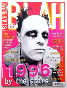 a magazine cover with a man's face painted pink and black on the front