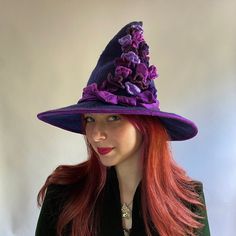 A soft brimmed witch hat with 3D nasturtium flowers on the crown. This hat is very packable as it is a soft witch hat, so can be easily fit into bags or suitcases.  You can order this hat in any color you like.  There is no upcharge for a color change. Our hats now come with adjustable bands but we like to get your head measurement just to make sure you get the proper fit.   How to measure your head: Use a soft measuring tape and measure around the middle of your forehead above the ears, and at the tightness you are comfortable with. All of my hats are hand felted Merino wool from non- tail docked sheep. The nature of hand felted wool means that there are many variables that are more or less difficult to control.  Your hat will not look 'exactly' like the one pictured but will be as near a Witchy Wide Brim Fitted Costume Hat, Witchy Costume Hats With Curved Brim For Fall, Witchy Fitted Hat With Curved Brim, Fitted Witchy Hat With Curved Brim, Fitted Brimmed Felt Hat For Halloween, Fitted Short Brim Felt Hat For Halloween, Whimsical Wide Brim Costume Hat, Whimsical Wide Brim Fitted Costume Hat, Whimsical Fitted Wide Brim Costume Hat