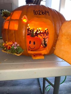 a pumpkin carved to look like it has been carved into the shape of a face