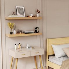 a bedroom with two shelvings above the bed and a small desk in front of it