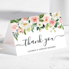 a thank card with pink flowers and greenery