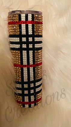 a black, white and red plaid beaded purse