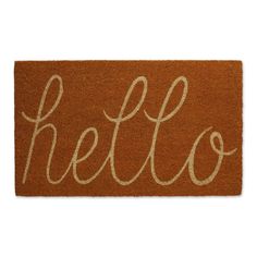 a door mat with the word hello written in white ink on an orange ground surface