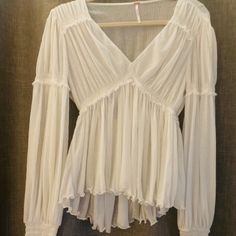 Free People, Soft White Crop Top, With Long Sleeves, 100% Nylon, Size Xs, Never Used , No Tag! Free People Vibes, Sparklemuffin Tour, Backpacking Wardrobe, White Style Outfit, Free People Outfits Fall, Sheer Top Outfit, White Top Long Sleeve, Poshmark Clothes, Crop Top With Long Sleeves