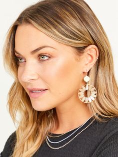 These shiny floral earrings elevate any outfit! Add these statement earrings to a flowy dress and some wedges for a complete look! Elegant Flower Earrings For Beach, Spring Flower Earrings For Parties, Elegant Summer Beach Hoop Earrings, Chic Hoop Earrings For Summer Beach, Chic Drop Earrings For Spring, Chic Hoop Earrings For Beach In Summer, Chic Gold Flower Earrings For Summer, Trendy Earrings For Spring, Feminine Summer Flower Drop Earrings