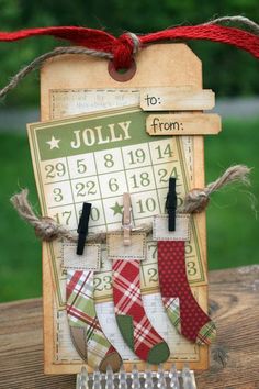 a wooden calendar with stockings hanging from it