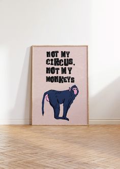 a poster with the words not my circus, not my monkeys on it in front of a white wall