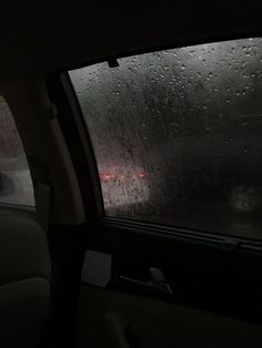 the rain is coming down in the car