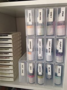 the shelves are filled with many different types of medicine bottles and labels for each container