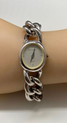 Beautiful Vintage Trifari Watch Chunky Heavy Silver Tone Watch Bracelet ladies watch pre/owned working condition new battery installed measures 7.5" length by 7:8" width Luxury Vintage Silver Watch Accessories, Cheap Vintage Metal Watches, Cheap Vintage Watches With Bracelet Strap, Vintage Trifari, Watch Bracelet, Women Wrist Watch, Ladies Watch, Wrist Watches, Womens Watches