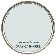 a white paint can with the words benjamin moore gray cashmere