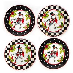 four black and white christmas plates with snowmen on the front, one wearing a top hat