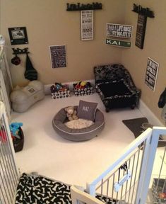 a baby's room is decorated with black and white decor, including pictures on the wall