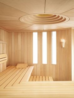 the inside of a sauna with wooden benches