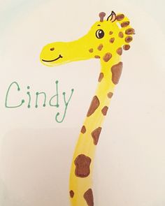 a child's drawing of a giraffe with the word ciny written on it