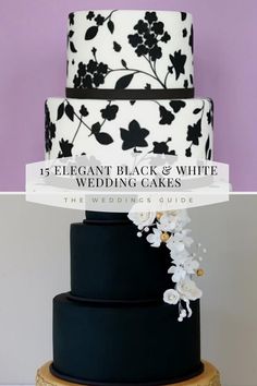 a black and white wedding cake with flowers on top