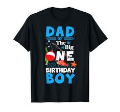 a black shirt that says dad of the big one birthday boy with fish on it