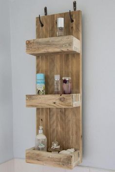 two wooden shelves with bottles and soaps on them