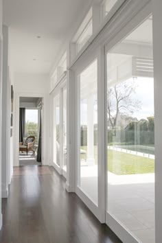 the instagram page shows an image of a house with large windows and wood floors