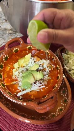 Lupita Gonzalez-Perez on Instagram: "Pozole Tradicional de Nuestra  Comida Mexicana 

Ingredientes

4 Libras de carne de puerco sin grasa
3 Lb de costilla de puerco
1 cabeza de ajos
1 Cebolla 
1 Cucharada Sal 

Para la salsa

8 Chiles guajillos
4 Dientes de ajo
1/2 Cebolla
1 Cucharadas sal

Para servir

1/2 Col o repollo
6 rábanos 
Chile triturado
Cebolla
Oregano 
Limón 
Aguacate

Preparación

• En una olla  poner a hervir la carne en suficiente agua junto con la cebolla el ajo y la sal hasta que este suave, aproximadamente dura 1 hora.

• Poner a hidratar los chiles guajillo en agua caliente.

• Licuar los chiles hidratados con el ajo la cebolla, los tomates y la sal al gusto.

• Agregar la salsa  a nuestra olla con la carne y dejarla hervir, para después incorporar el maíz para pozolero