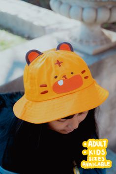 FUSSY TIGER bucket hat Hat Circumference:﻿ Kids 22.5 in / 57 cm Adults 25 in / 63.5 cm Made with 100% cotton. CARE INSTRUCTIONSMachine wash cold on a gentle cycle. Recommend air drying to maximize the longevity of the ears, but you can also tumble dry on low as well! Kidcore Hat, Aesthetic Bucket Hat, Bunny Cap, Cute Bucket Hats, Bucket Hat Outfit, Rain Cap, Cat Eared Beanie, Kidcore Aesthetic, Fun Clothing