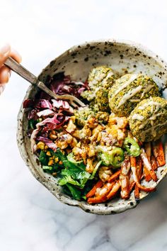 a bowl filled with different types of food