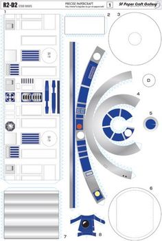 a paper model of a space station with blue and white details on the front, side and