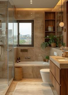 a bathroom with a toilet, sink and bathtub next to a window in it