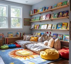 a child's bedroom with lots of books on the shelves