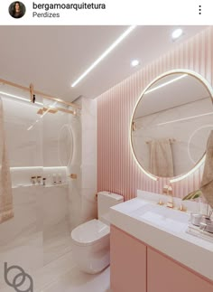 the bathroom is decorated in pink and white with a round mirror on the wall above the sink